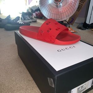 Red Gucci slides